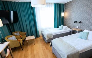 Фото номера Двухместный номер «Комфорт» с 1 кроватью Отель Hotel Hirvi г. Ээнекоски 7