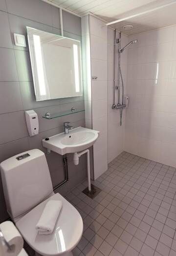 Фото номера Двухместный номер «Комфорт» с 1 кроватью Отель Hotel Hirvi г. Ээнекоски 9