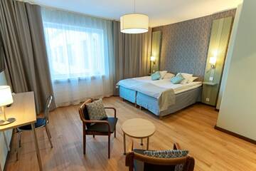 Фото Отель Hotel Hirvi г. Ээнекоски 2