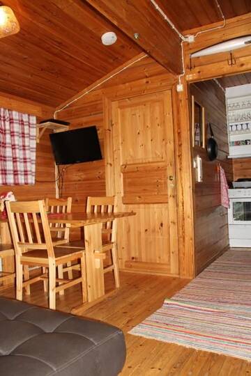 Фото номера Коттедж с сауной (Harmaa Hukka) Дома для отпуска Accommodation and Fishing Vonkale г. Ээнекоски 17